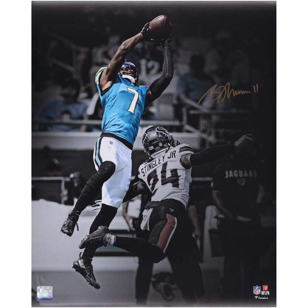Brian Thomas Jr. Jacksonville Jaguars Autographed 16" x 20" Leaping Catch Spotlight Photograph - FA