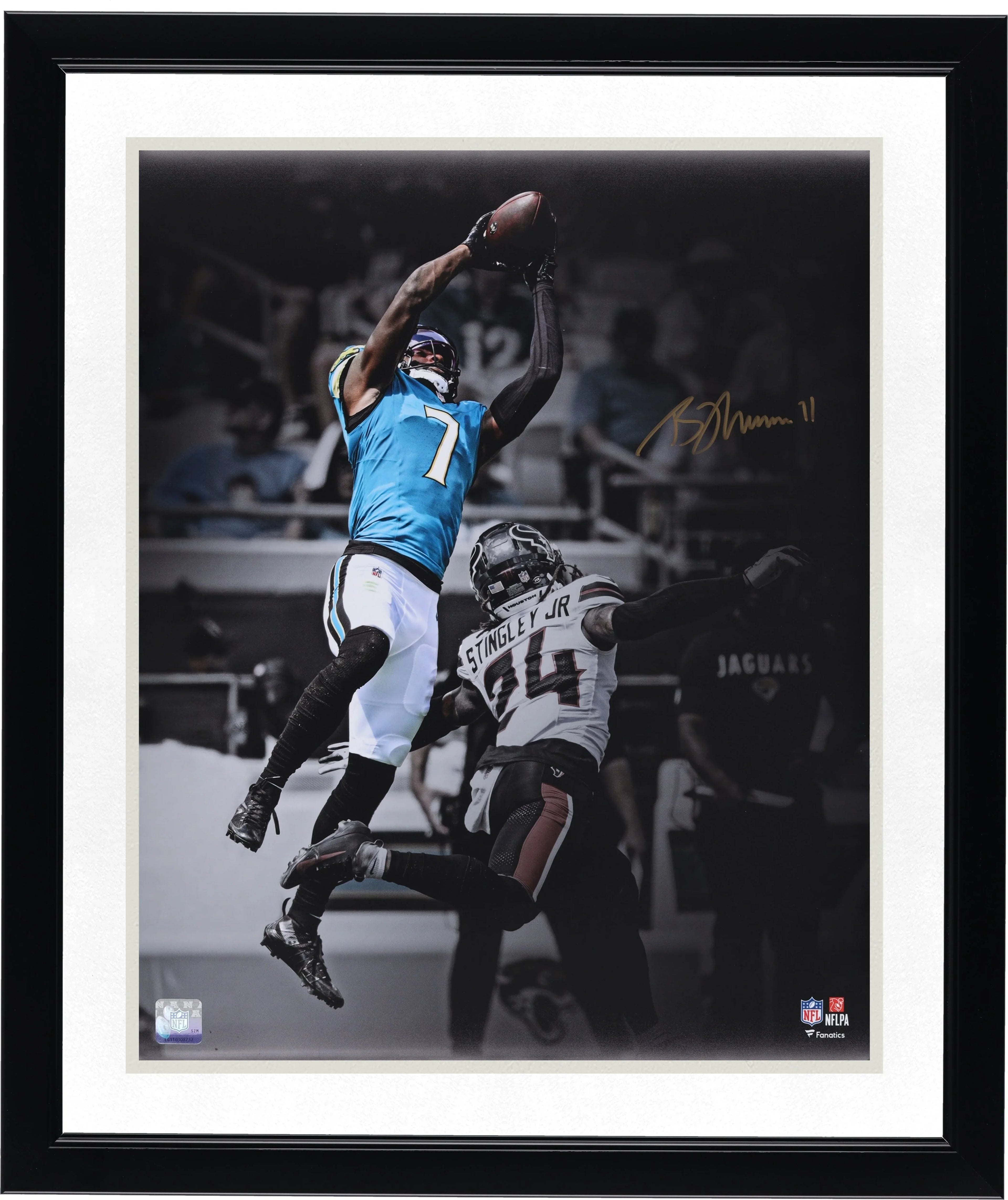 Brian Thomas Jr. Jacksonville Jaguars Autographed 16" x 20" Leaping Catch Spotlight Photograph - FA